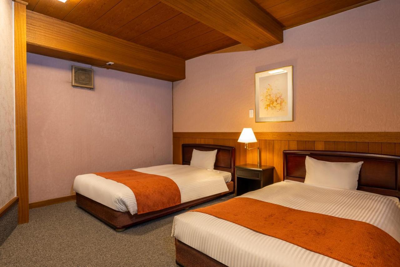 Hotel New Akao Атами Екстериор снимка